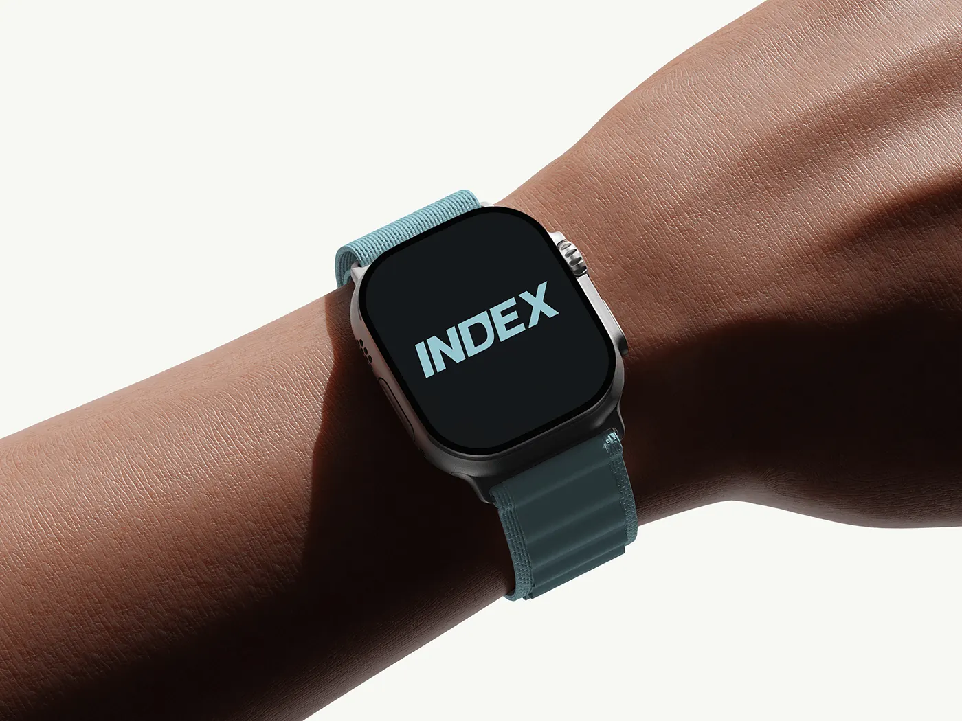 Smartwatch showing the INDEX wordmark in ice blue on a dark screen